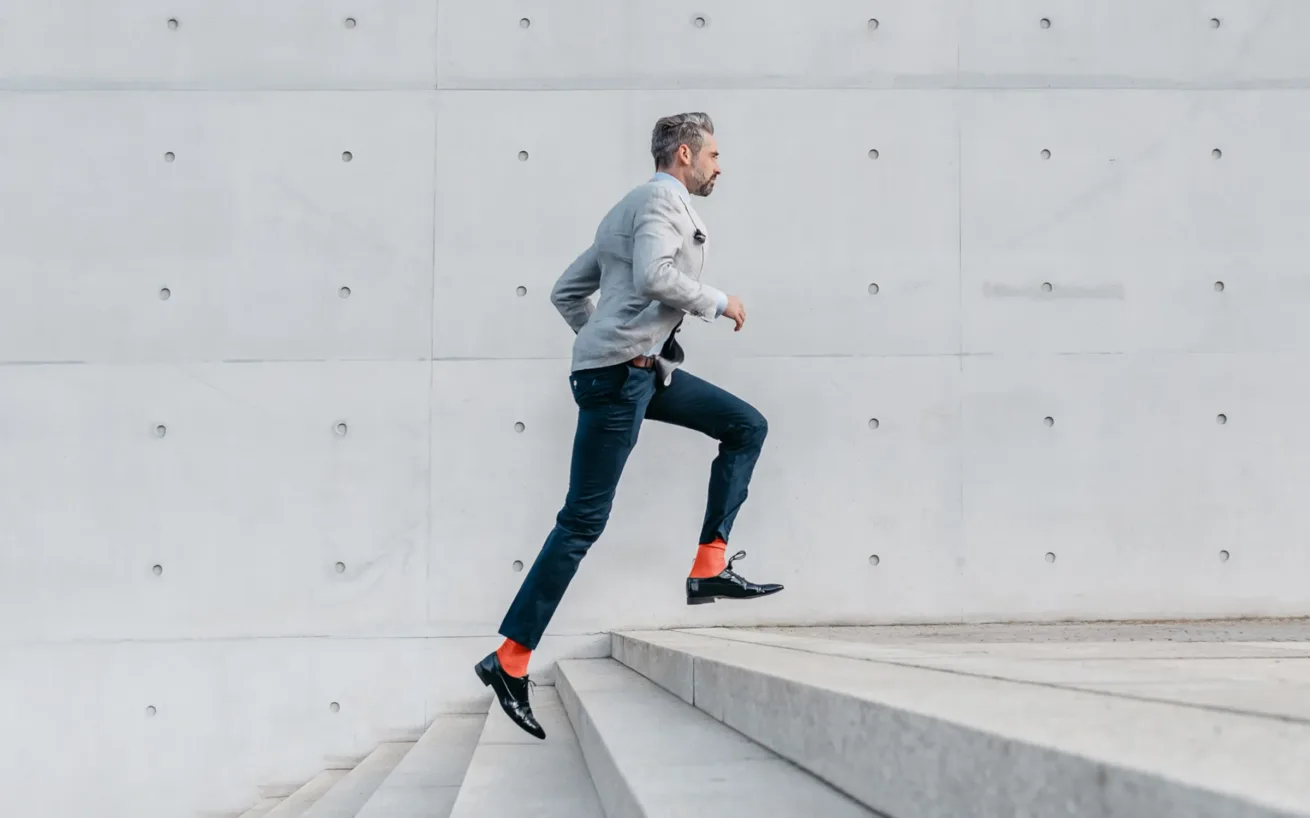 Man running up stairs