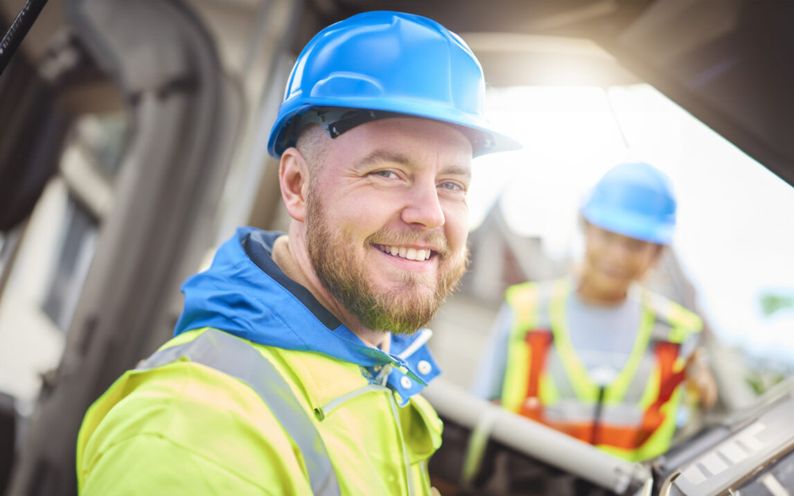 male site engineer poses for the camera