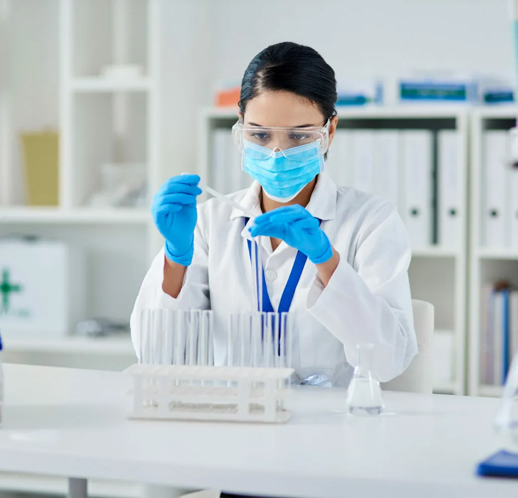 Shot of a young scientist conducting an experiment in a laboratory