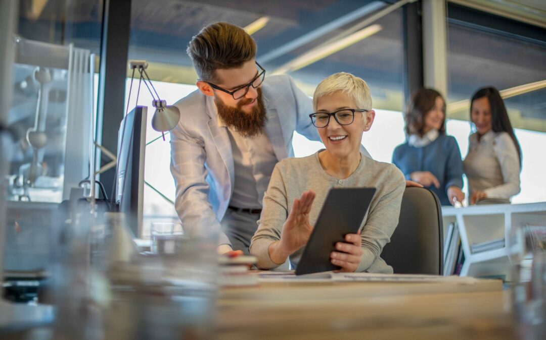 Business woman talking to a colleague