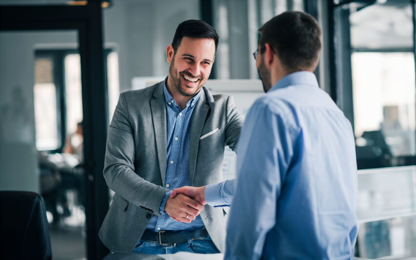 Portrait of young manager handshake with new employee