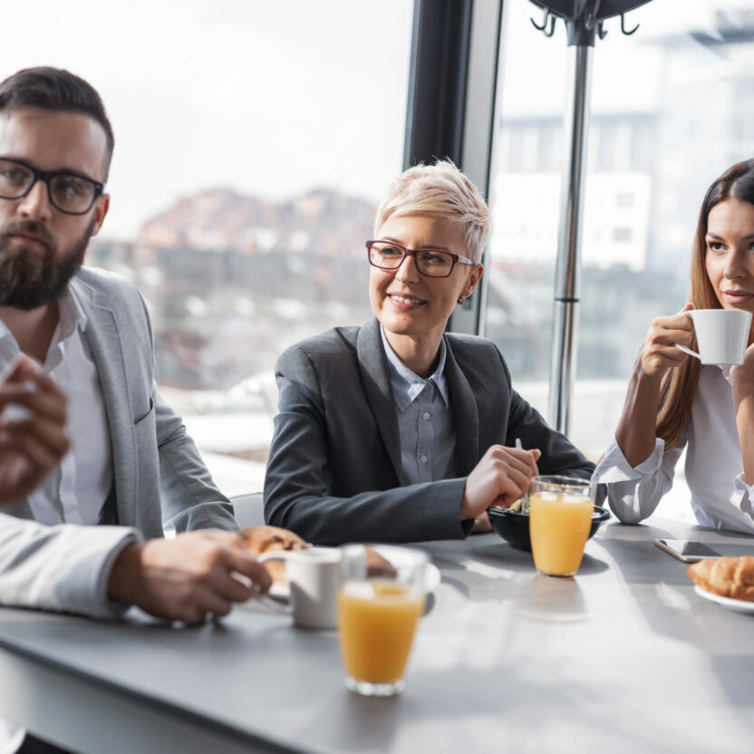 Business people having Breakfast in an office