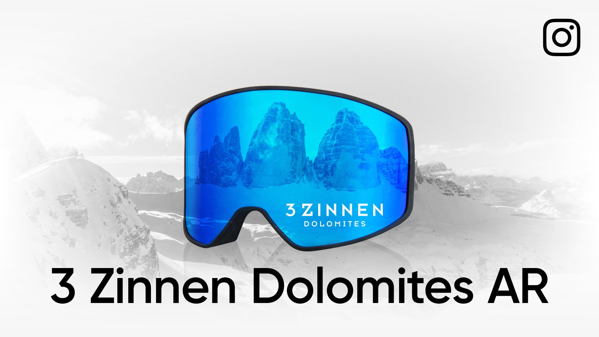 Grafik von einer großen blauen Skibrille. Dahinter sieht man die Dolomiten. Darunter steht "3 Zinnen Dolomites AR"