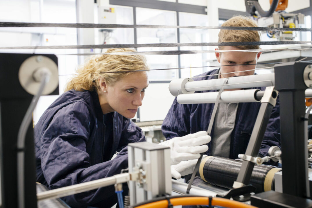 Employees of SGL Carbon working with carbon fibers