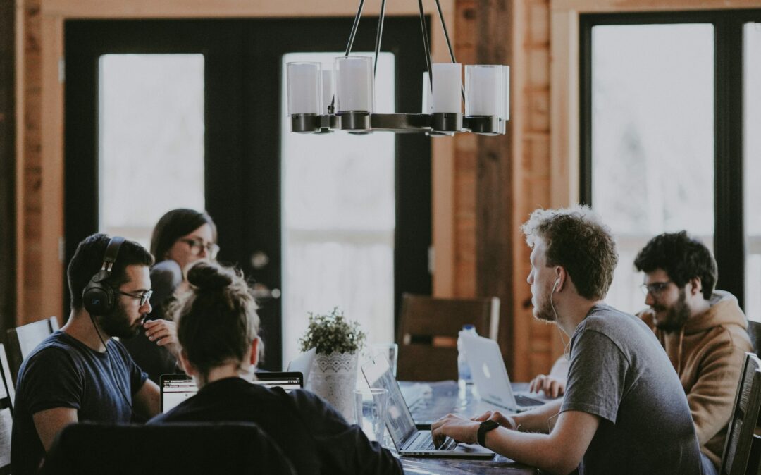 VTEX Employee sitting at the table in a meeting