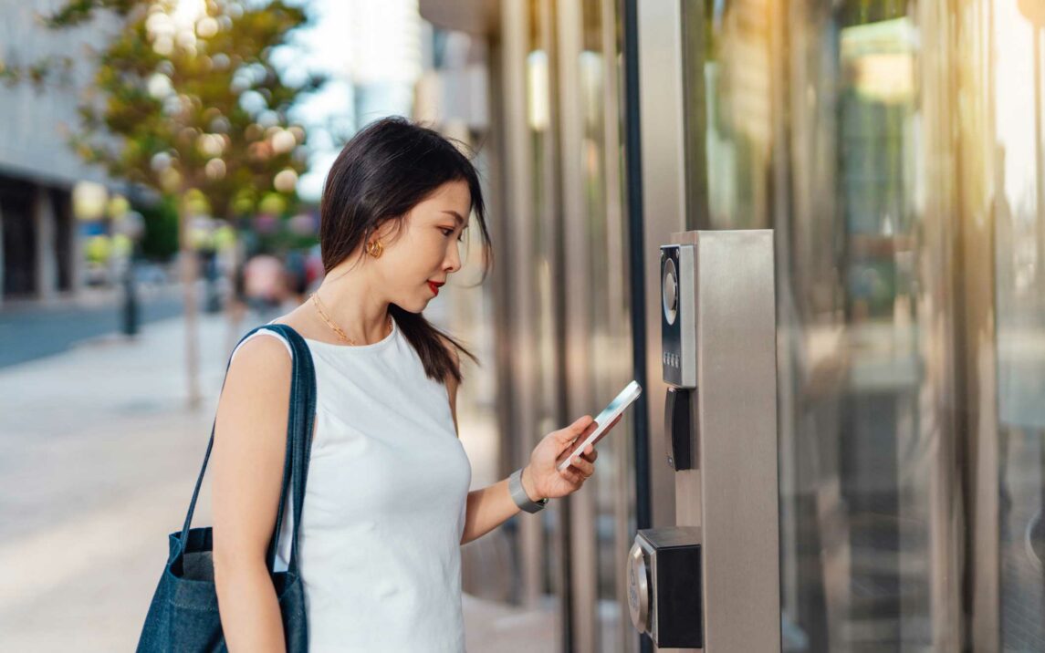 young businesswoman entering office building