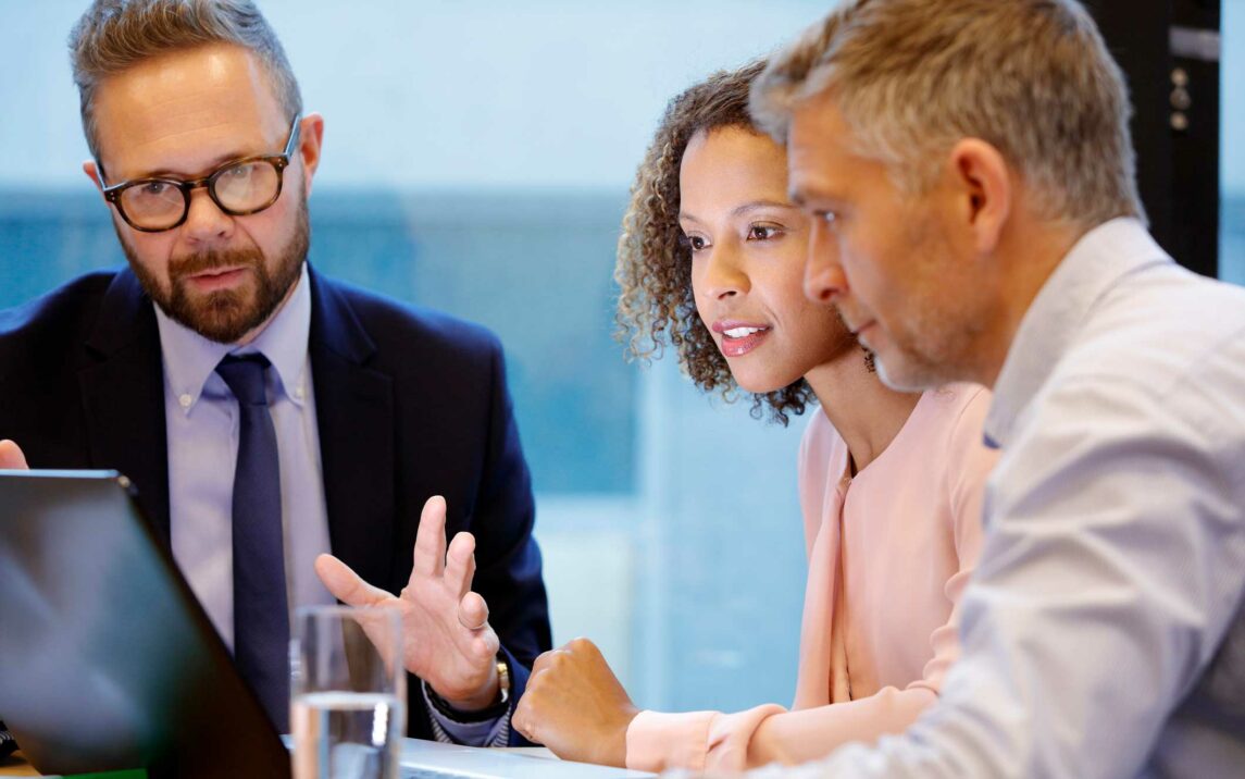 financial advisor having a meeting with couple