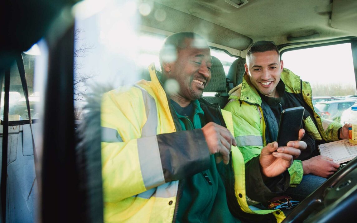 workers in their van