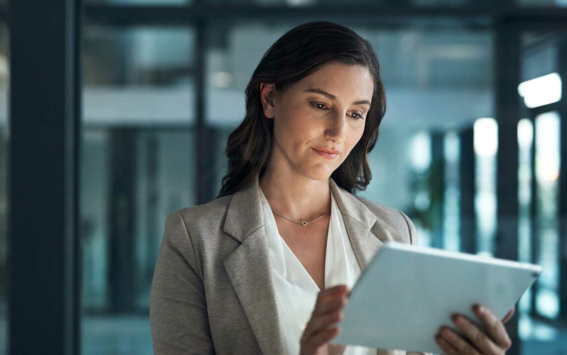 woman on tablet and browsing the internet