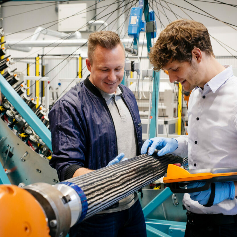 Employees of SGL Carbon checking carbon fibers