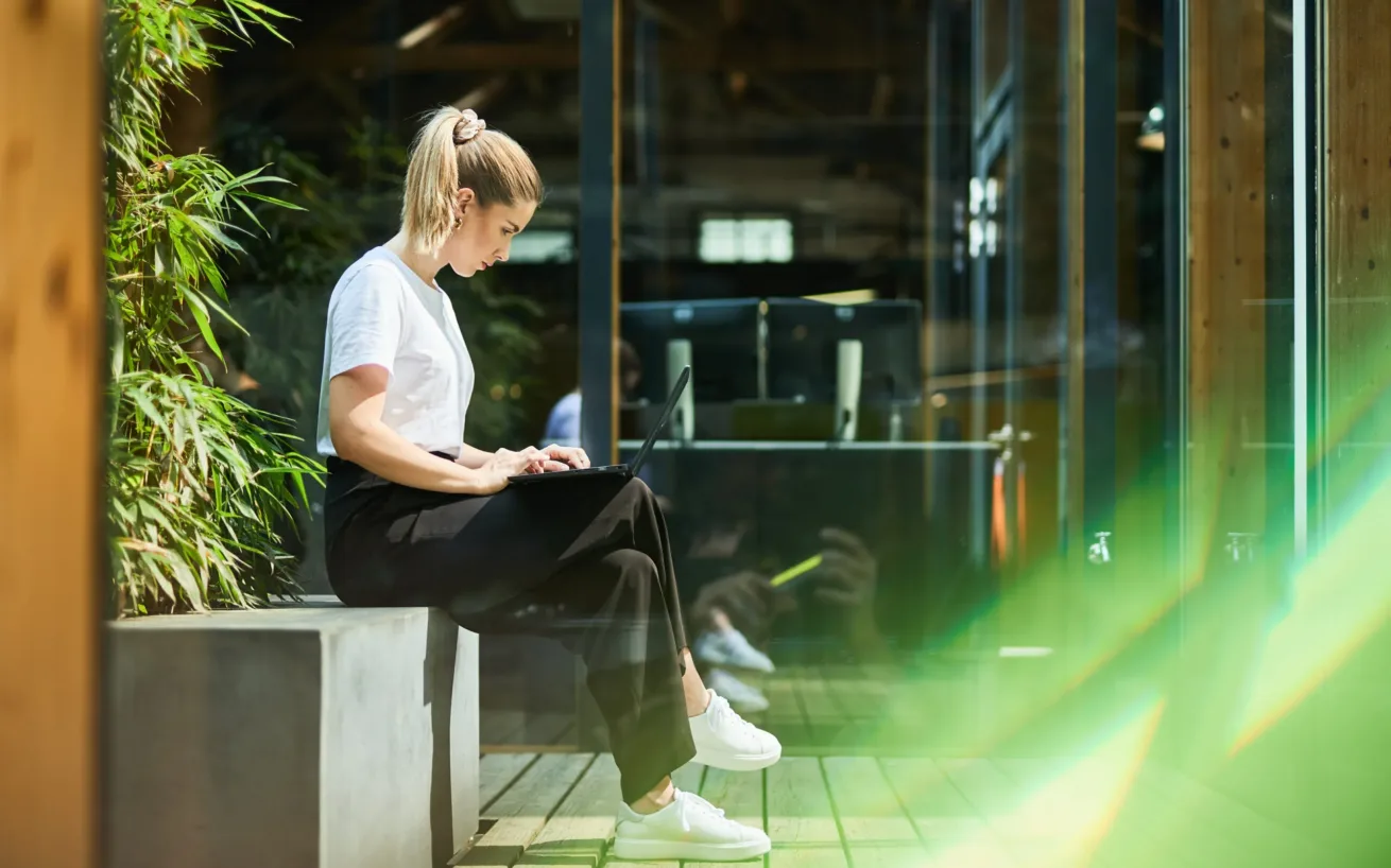 valantic employee looking at her laptop